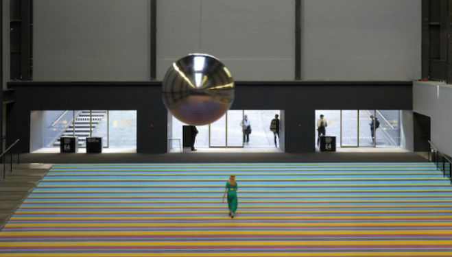  The Tate's Turbine Hall has been filled with dozens of three-seater swings