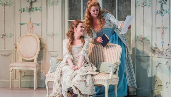 Kitty Whately and Eleanor Dennis weigh up the odds in Così Fan Tutte at Opera Holland Park. Photo: Robert Workman