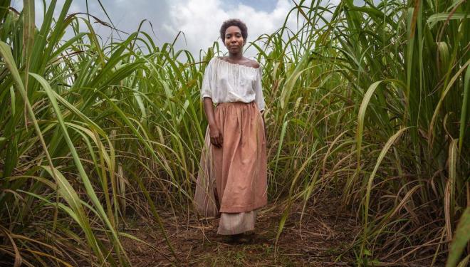 Tamara Lawrance plays July, a Jamaican slave in the 19th century