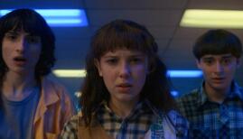 Finn Wolfhard, Millie Bobby Brown, and Noah Schnapp in Stranger Things 4, Netflix (Photo: Netflix)