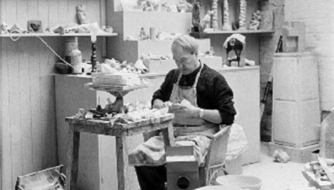 HENRY MOORE working on a plaster in the Maquette Studio, Perry Green, c. 1960. Photo by John Hedgecoe. Reproduced by permission of The Henry Moore Foundation