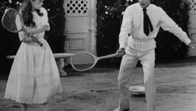 Leslie Caron's Gigi and Louis Jourdan's Gaston play beach tennis in Vincente Minnelli's musical