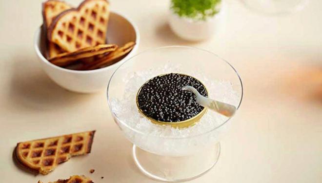Neptune Devon caviar with freshly made potato waffle & house cultured Jersey cream, photograph by Steven Joyce