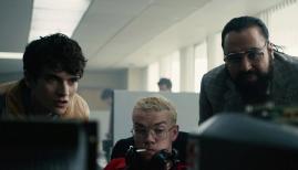 Fionn Whitehead, Will Poulter and Asim Chaudhry in Black Mirror: Bandersnatch