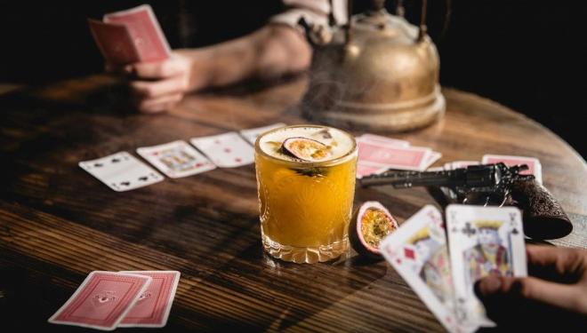 Sip cocktails in a wild west saloon 