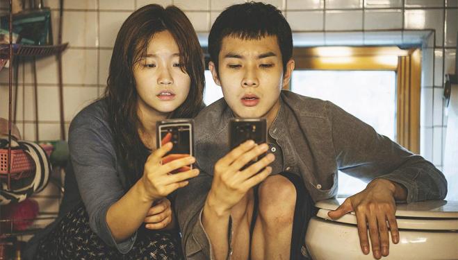 Woo-sik Choi and So-dam Park in Parasite