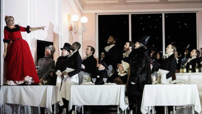 Lauren Fagan's Musetta causes havoc at Café Momus, in Covent Garden's La Bohème. Photo: Camilla Greenwell