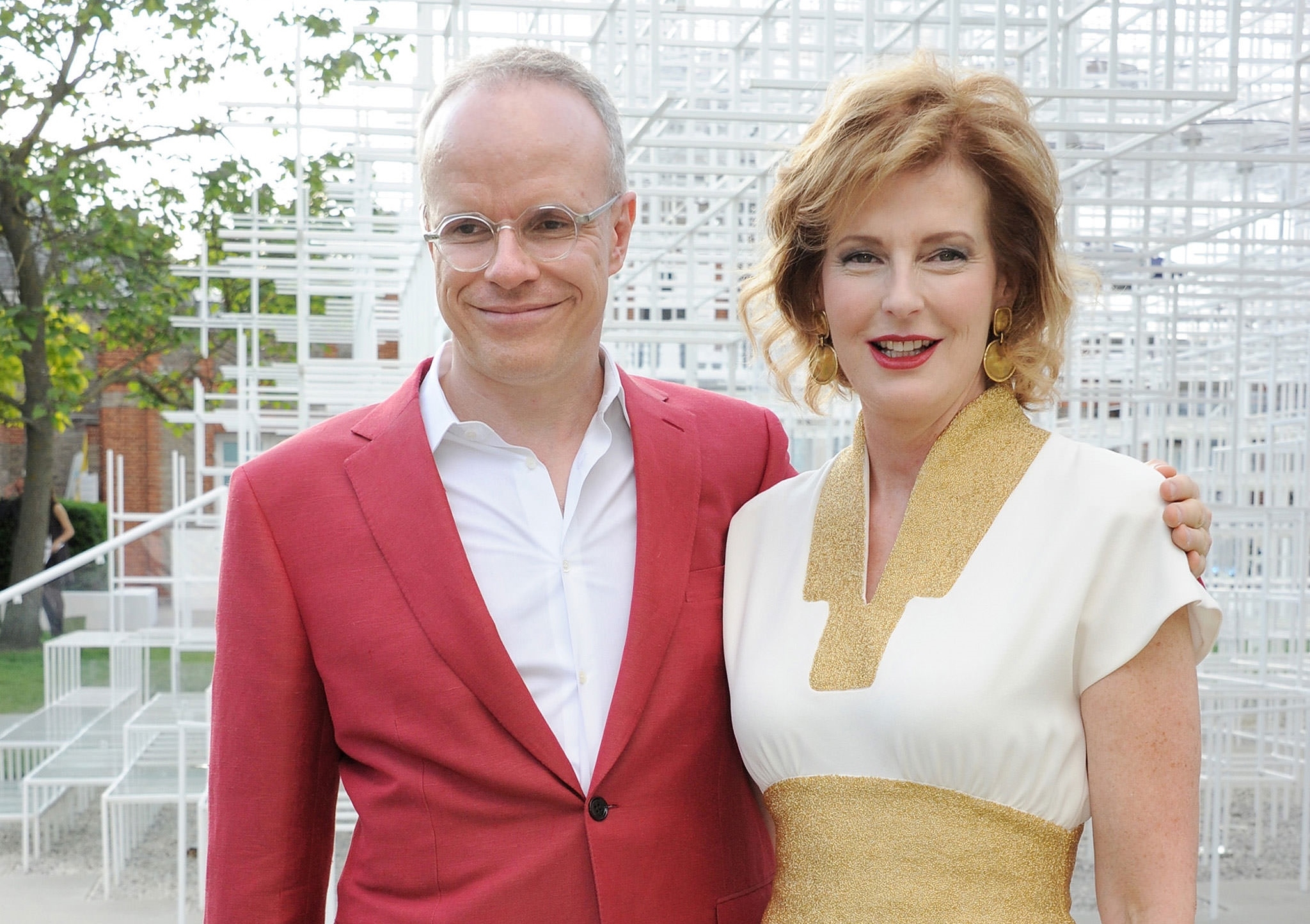 Hans Ulrich Obrist (in flamboyant Brioni suit) with Serpentine co-director Julia Peyton-Jones